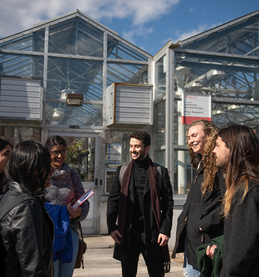 A group of people standing outside a building