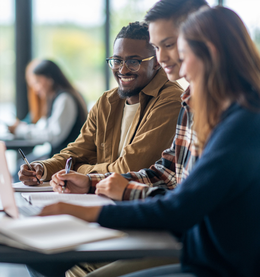 A group of students sitting at a table