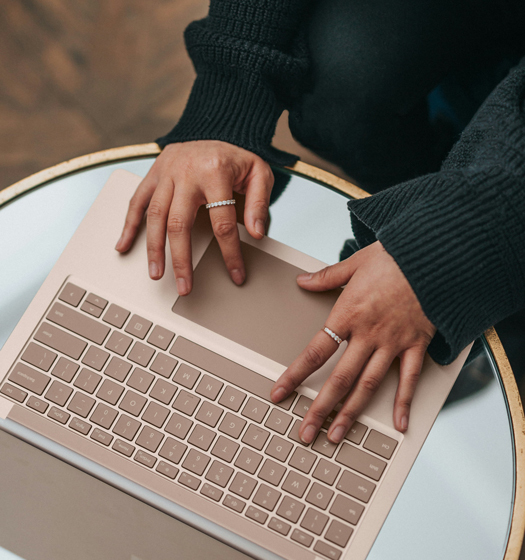 A person typing on a computer