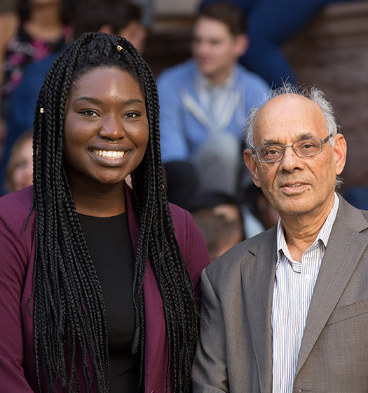 Two people smiling at camera